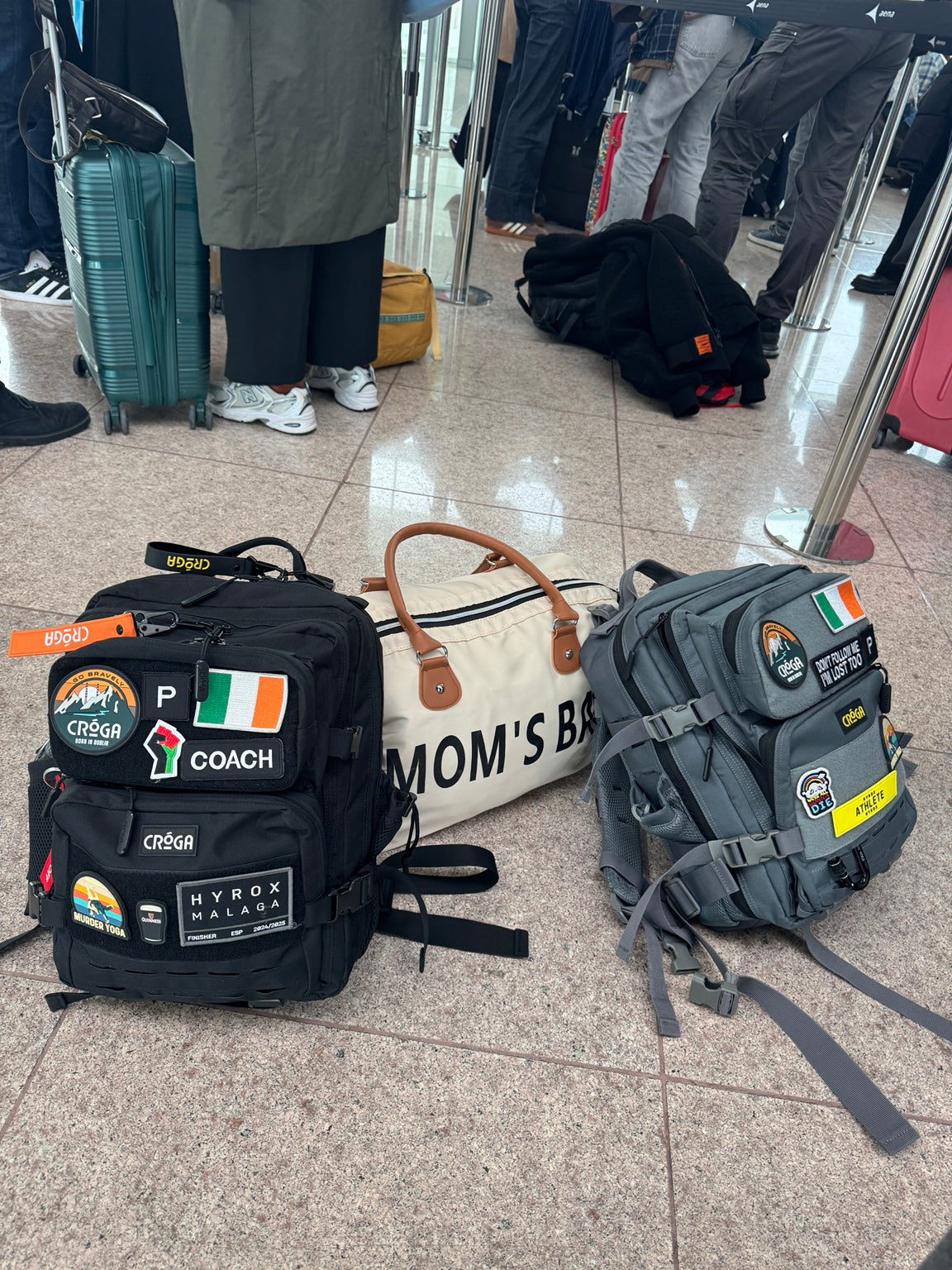 Nomad 25L Carbon Black and Wicklow Grey backpacks while travelling