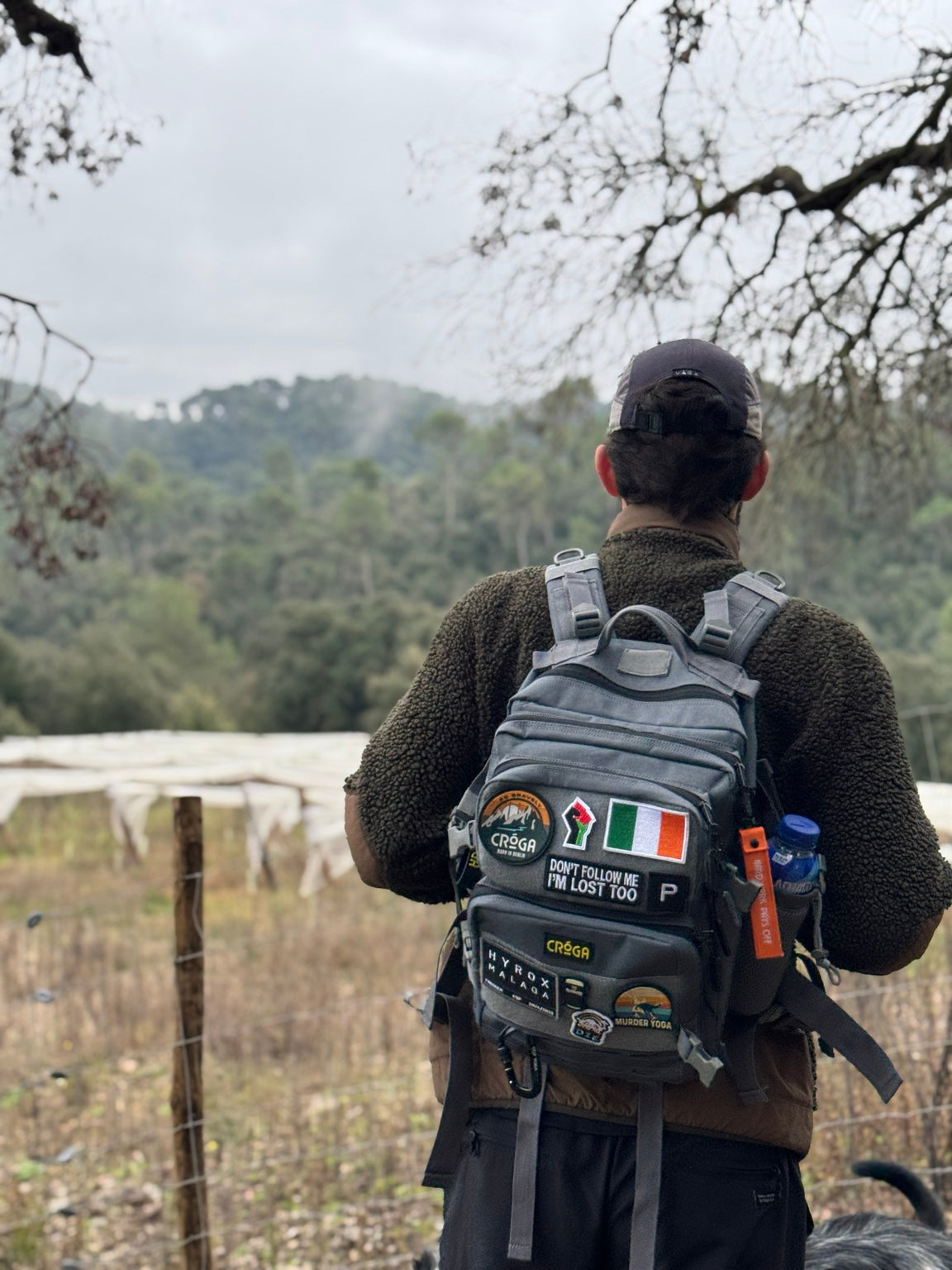 Nomad 25L Wicklow Grey backpack worn on a scenic hike