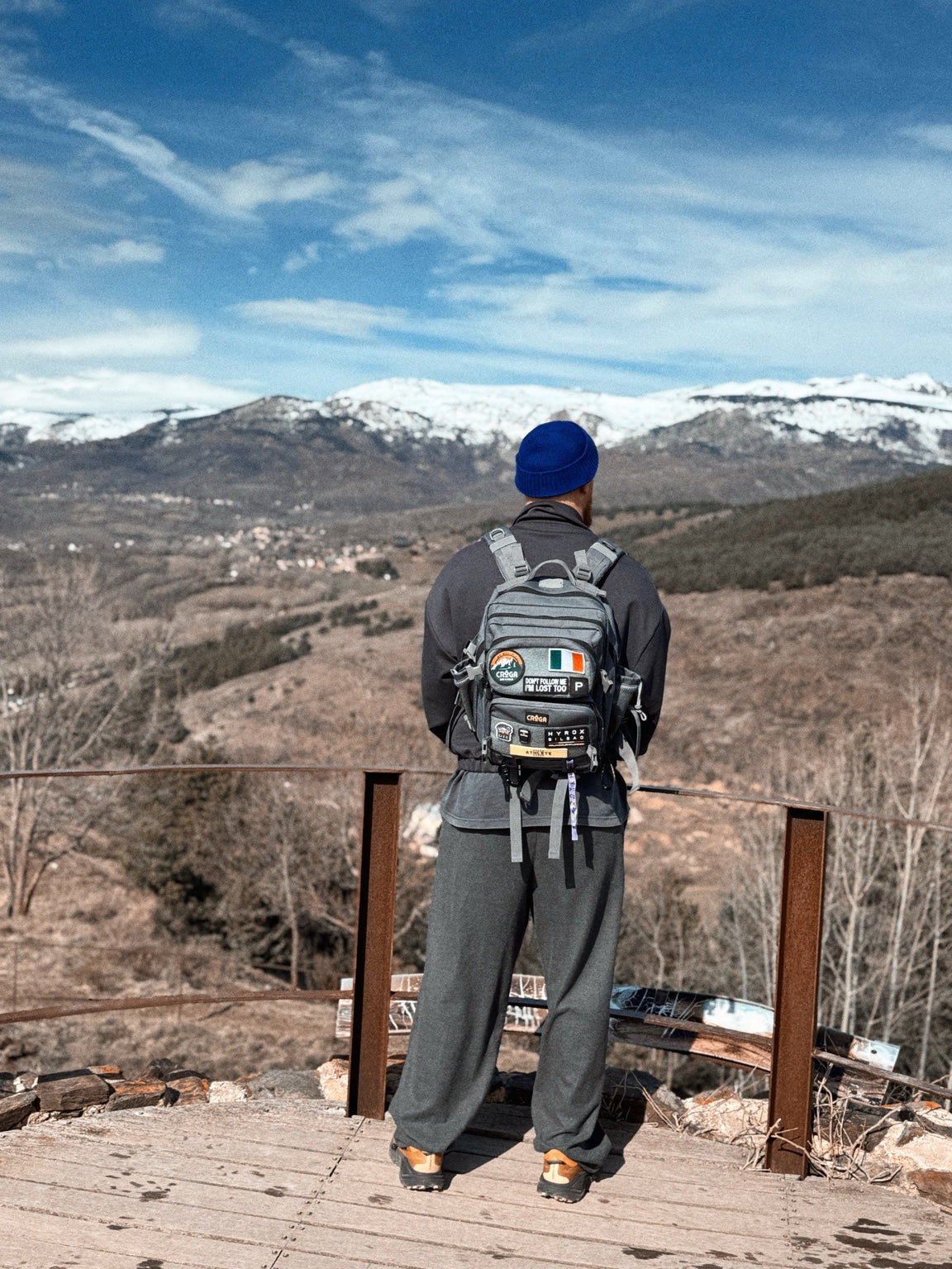 Nomad 25L Wicklow Grey backpack worn on a mountain adventure